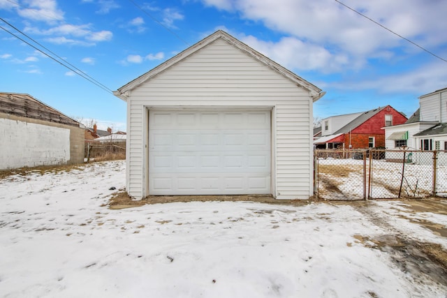 view of snow covered garage