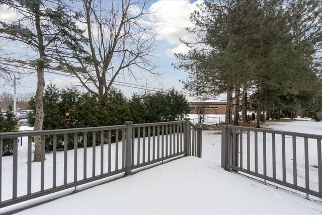 view of snow covered deck