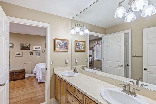 bathroom featuring vanity and hardwood / wood-style floors