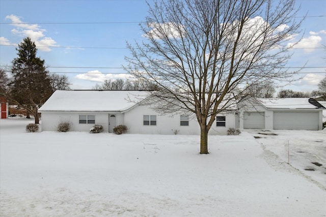 single story home with a garage