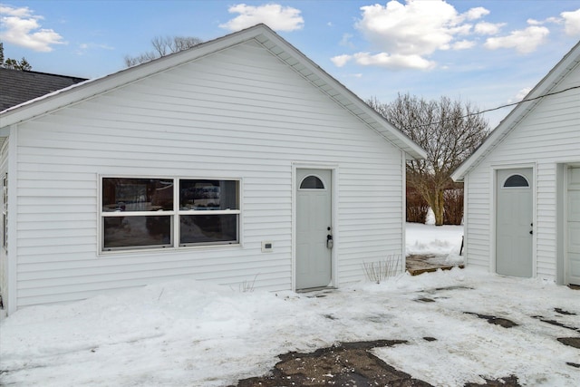 view of snow covered house