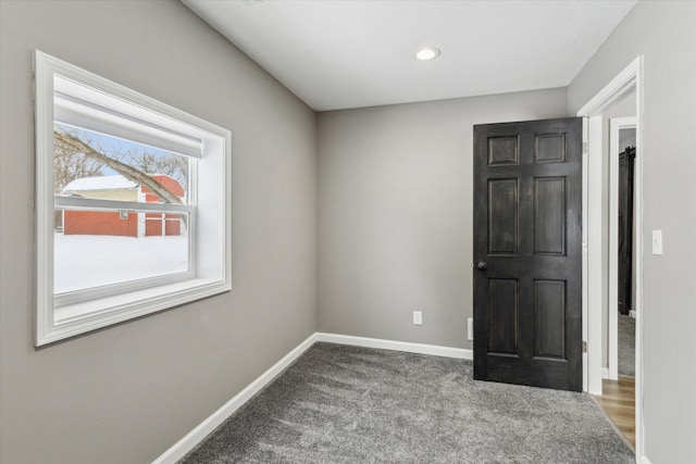 view of carpeted spare room