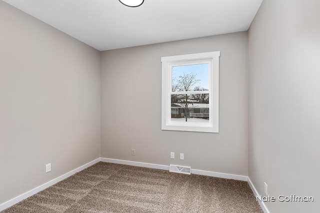 empty room with carpet floors