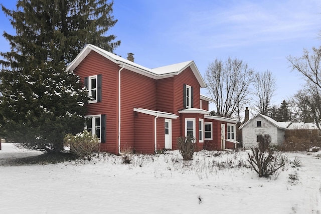 view of snow covered property