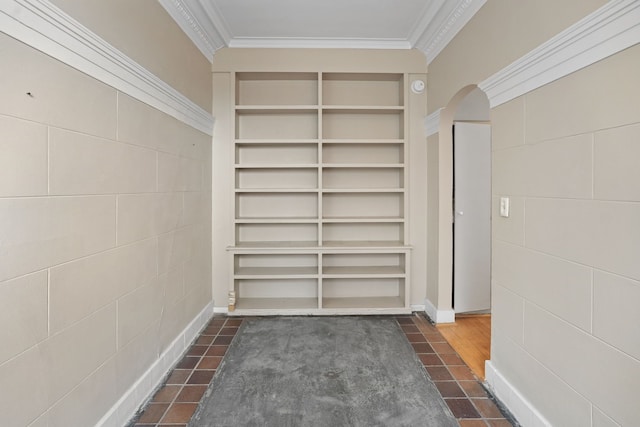 walk in closet featuring dark tile patterned floors