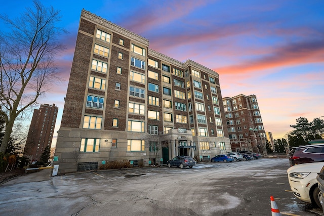 view of outdoor building at dusk