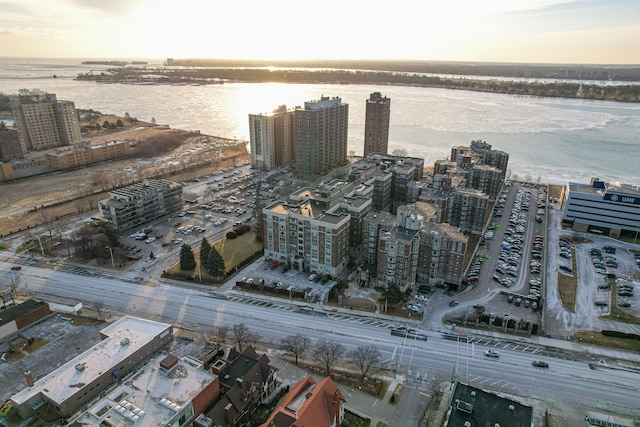 aerial view at dusk with a water view