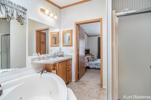 bathroom with ornamental molding, independent shower and bath, and vanity