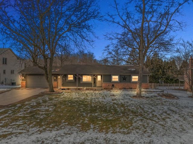 single story home with a garage