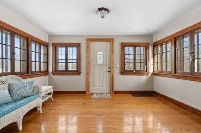 foyer with light wood-type flooring