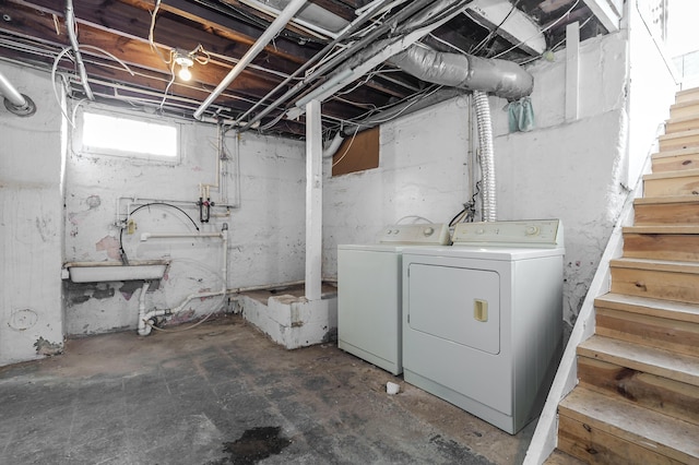 basement featuring separate washer and dryer