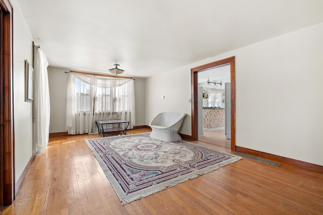 sitting room with light wood-type flooring