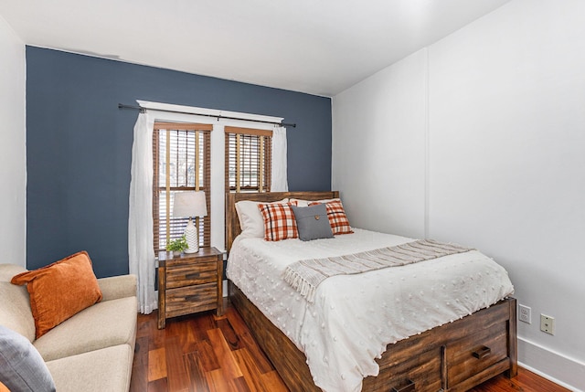 bedroom featuring dark wood-type flooring