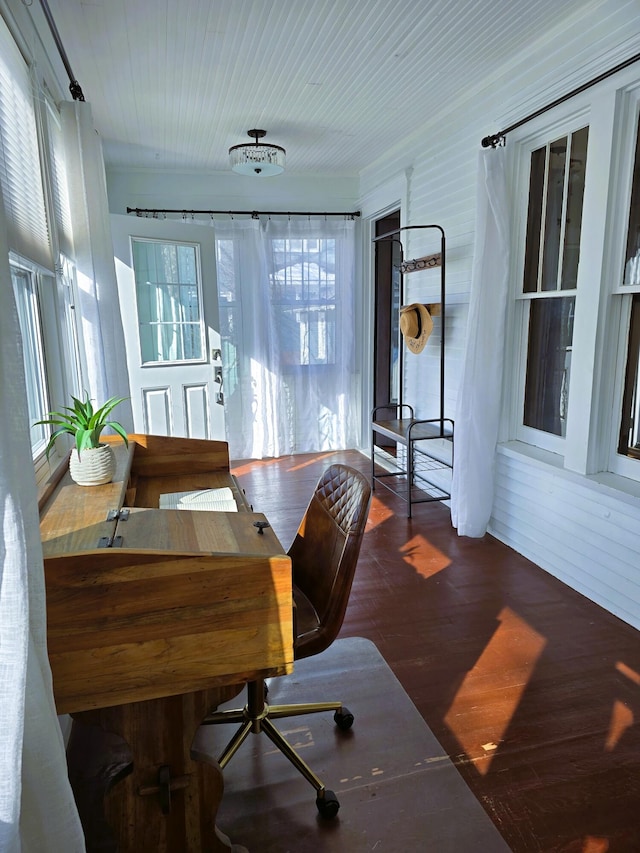 home office with hardwood / wood-style flooring