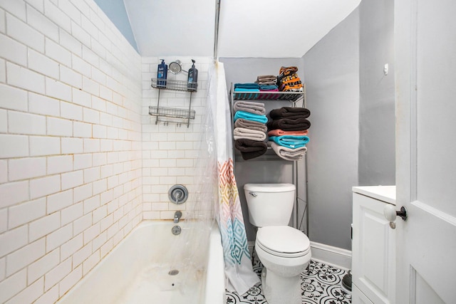 full bathroom with vanity, shower / bath combination with curtain, tile patterned floors, and toilet