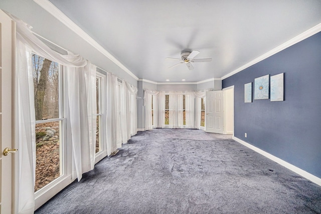 unfurnished sunroom with ceiling fan