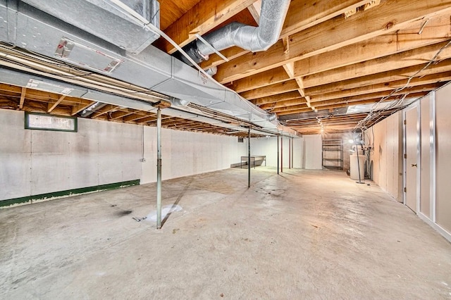 basement featuring water heater