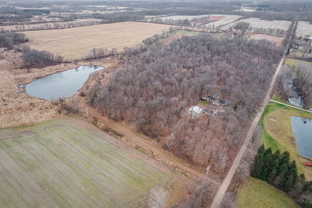 aerial view with a water view and a rural view