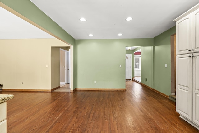 interior space with dark hardwood / wood-style floors