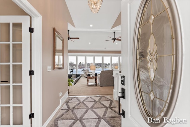 hallway featuring lofted ceiling