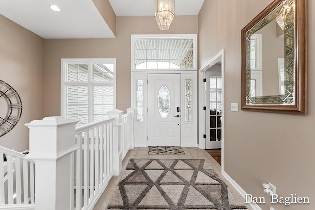 entryway featuring an inviting chandelier