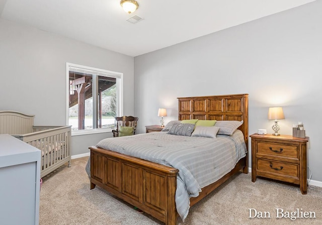 bedroom with light carpet