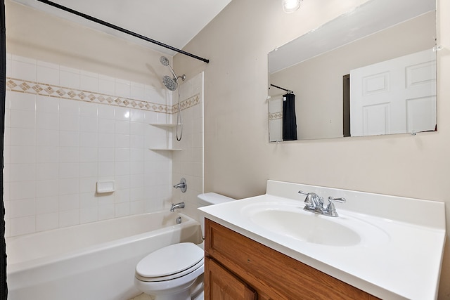 full bathroom with vanity, shower / tub combo, and toilet