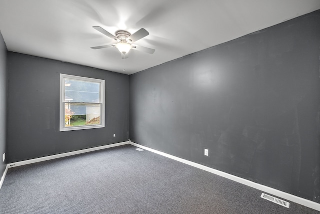 spare room with ceiling fan