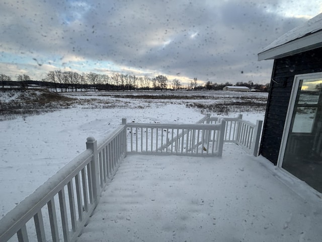 view of snow covered deck