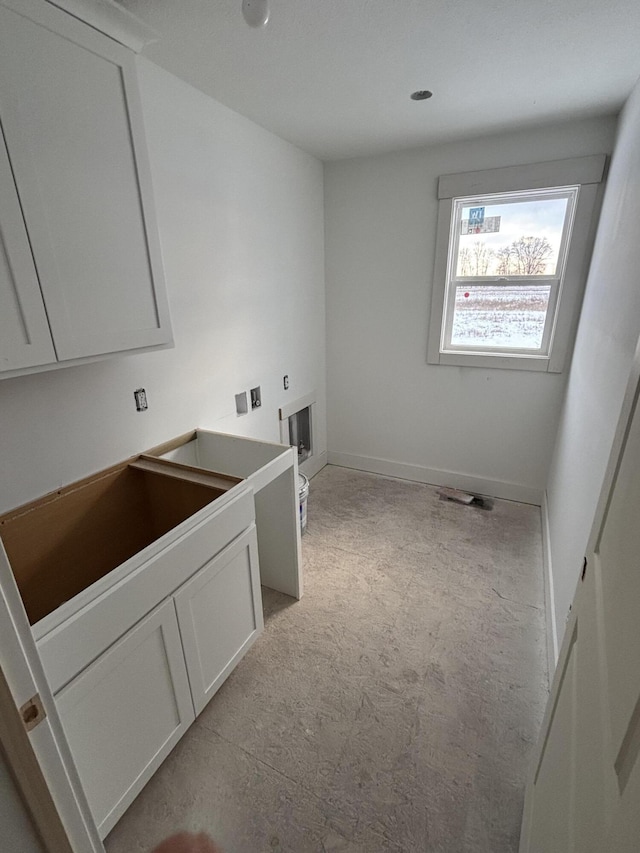 laundry area featuring cabinets, washer hookup, and hookup for an electric dryer