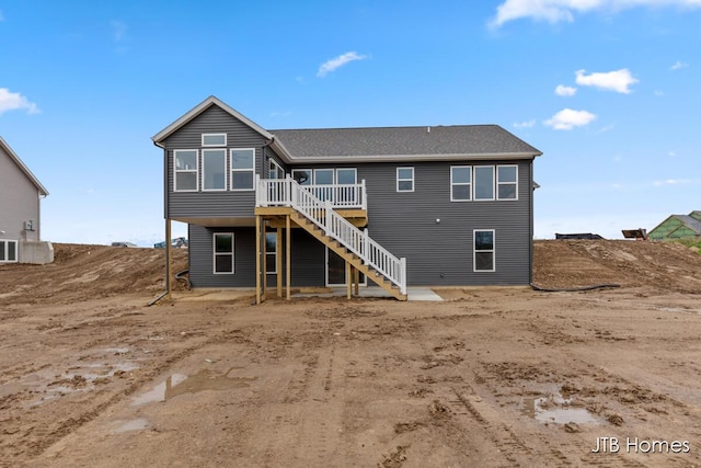 3432 Conrail Dr, Byron Center, MI 49315 - back of property featuring stairs and a wooden deck