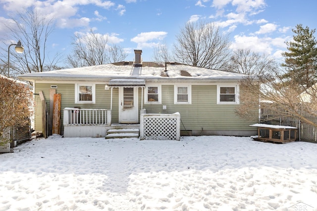 view of snow covered property