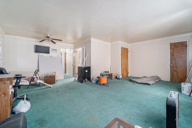 living room featuring ceiling fan and carpet floors