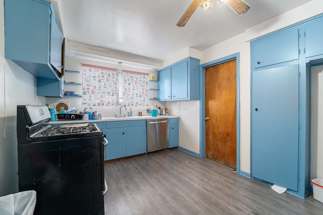 kitchen featuring blue cabinets, sink, stainless steel dishwasher, and range with gas cooktop