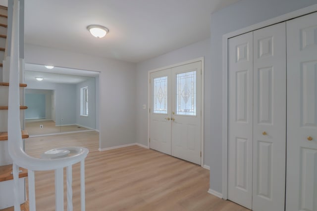 entrance foyer with light wood-type flooring