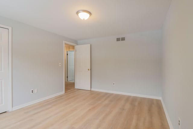 empty room featuring light hardwood / wood-style floors