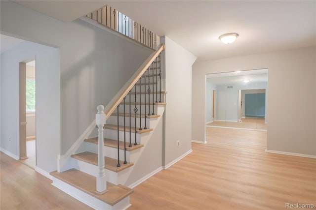 6868 Vachon Dr, Bloomfield Hills, MI 48301 - staircase with wood finished floors and baseboards