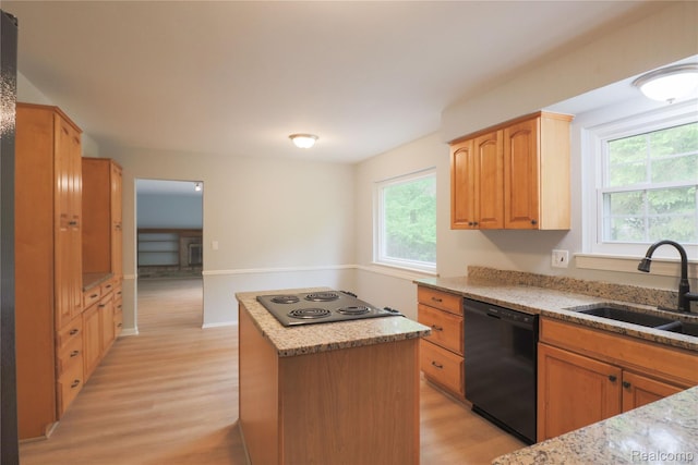 6868 Vachon Dr, Bloomfield Hills, MI 48301 - kitchen with dishwasher, stovetop, a sink, light wood-style floors, and a kitchen island