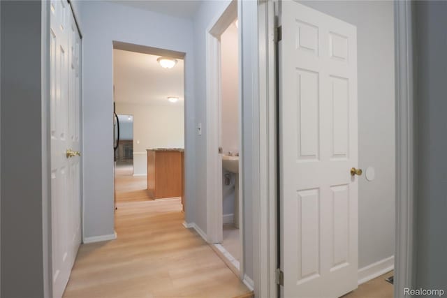 6868 Vachon Dr, Bloomfield Hills, MI 48301 - hall featuring light wood-type flooring and baseboards