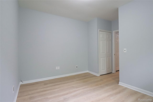 6868 Vachon Dr, Bloomfield Hills, MI 48301 - spare room with light wood-style floors and baseboards