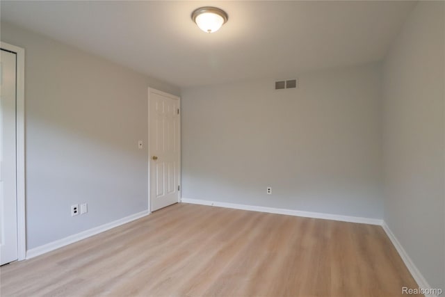 6868 Vachon Dr, Bloomfield Hills, MI 48301 - empty room with light wood finished floors and baseboards