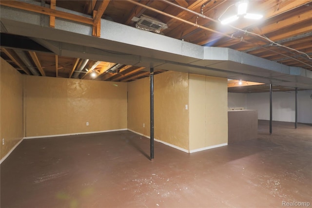 6868 Vachon Dr, Bloomfield Hills, MI 48301 - unfinished below grade area featuring baseboards