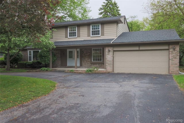 6868 Vachon Dr, Bloomfield Hills, MI 48301 - traditional home with brick siding, driveway, covered porch, and a garage
