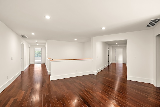 empty room featuring dark hardwood / wood-style floors