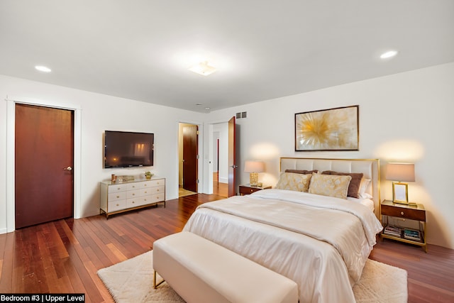 bedroom featuring wood-type flooring