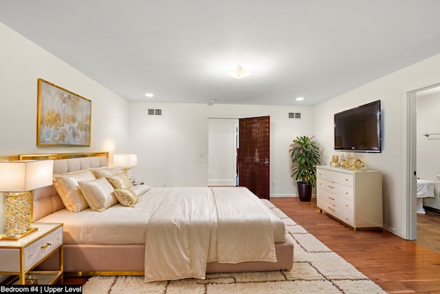 bedroom featuring light wood-type flooring