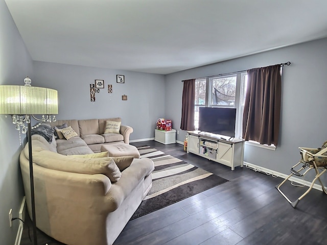 living room featuring dark hardwood / wood-style flooring