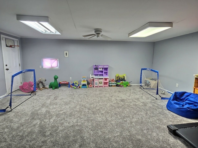 game room featuring ceiling fan and carpet