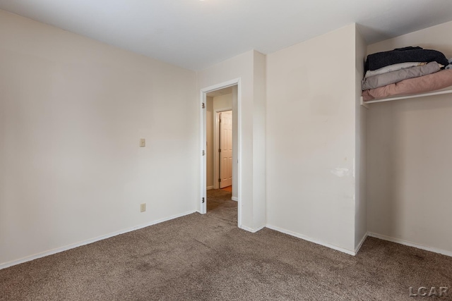 unfurnished bedroom with carpet floors