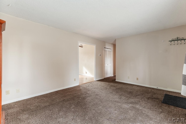 spare room with carpet floors